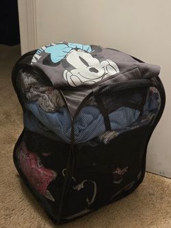 Basket of girl's clothes