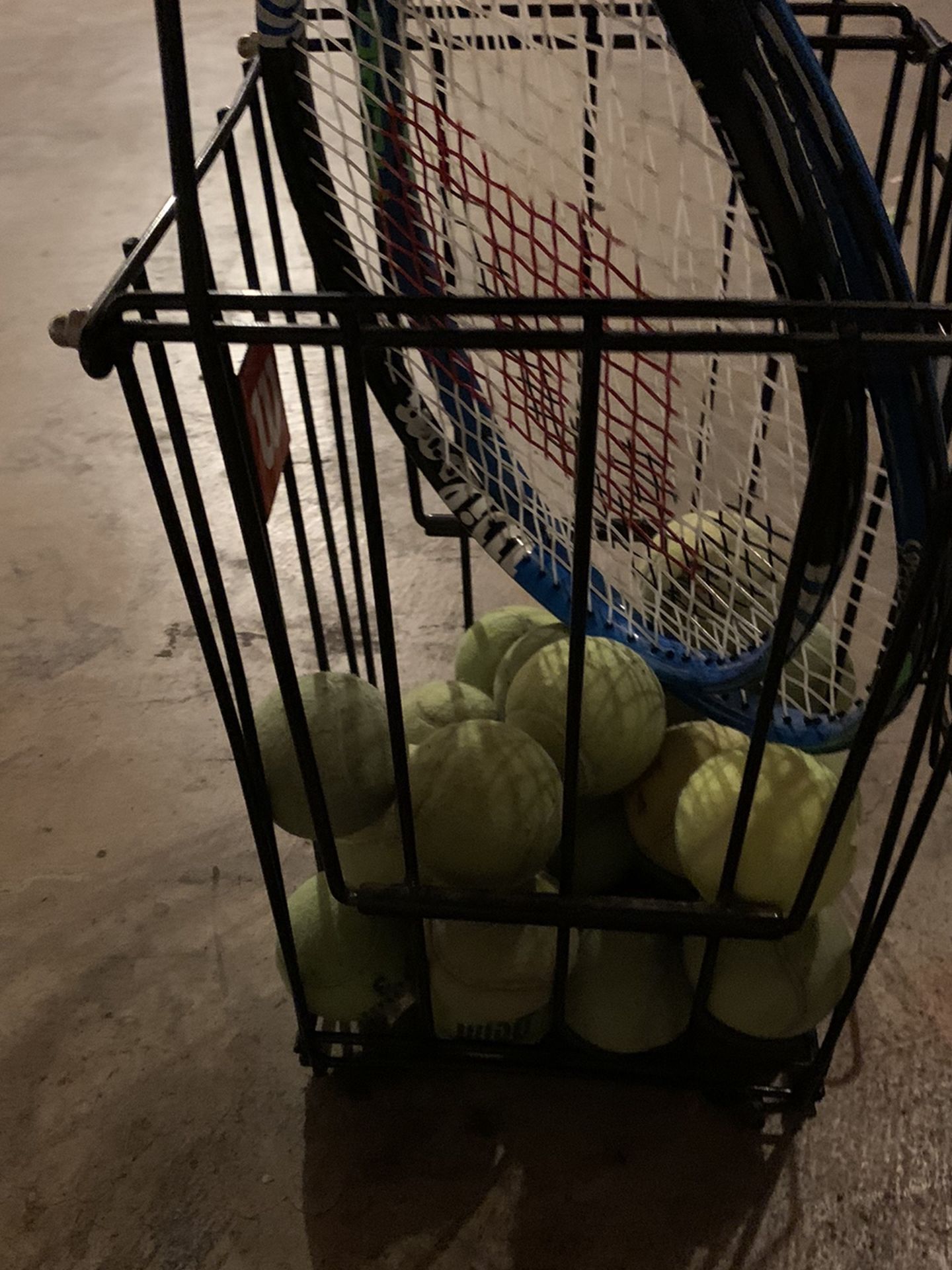 2 Tennis Rackets With Balls And A Ball Cart. 3 Tennis Bags Included