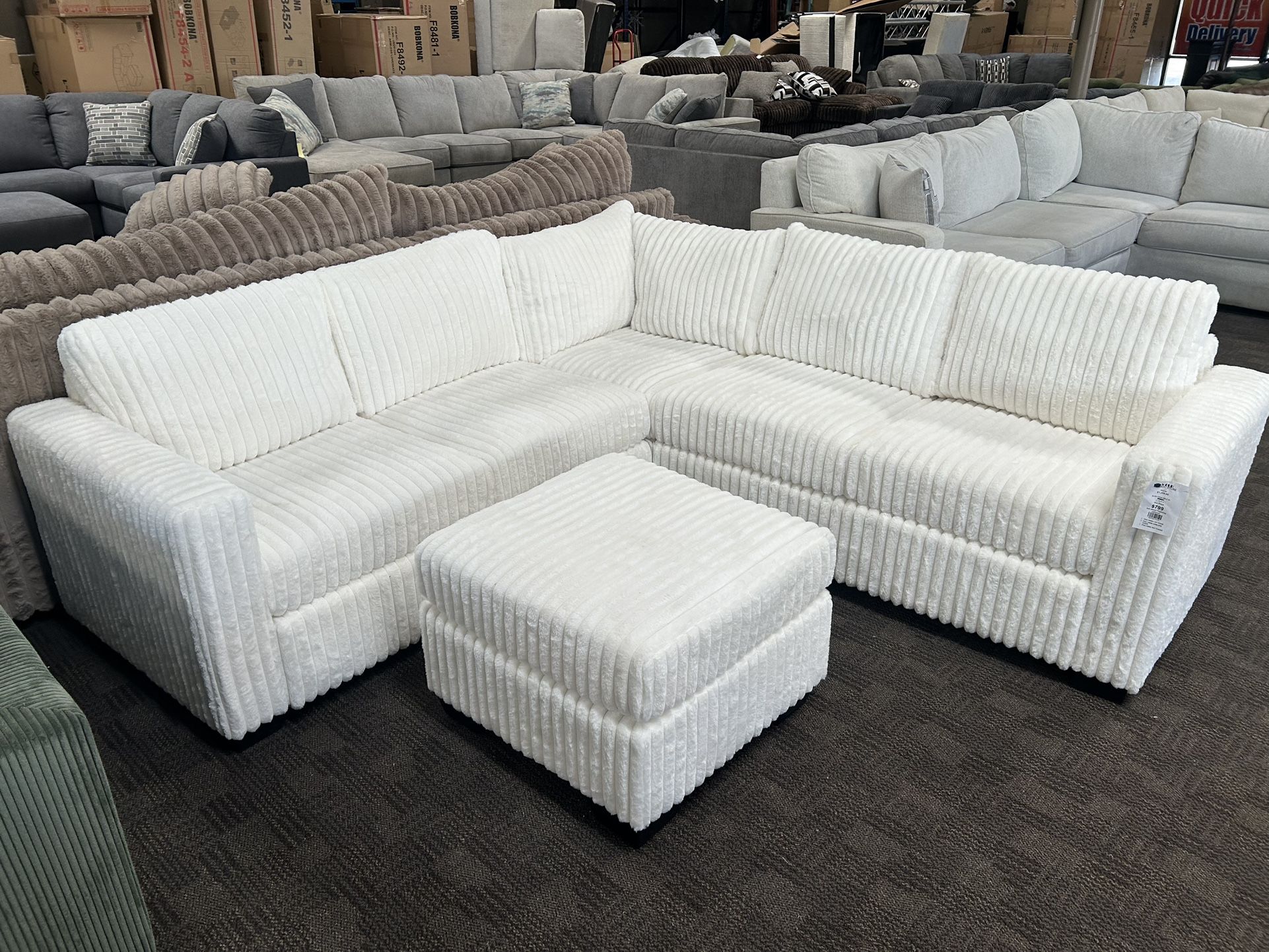 White Ivory Sectional And Ottoman