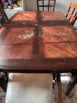 Table with 6 chairs and an extension and china cabinet