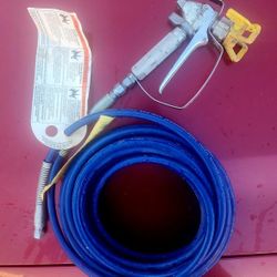 airless paint spraying hose and gun 
