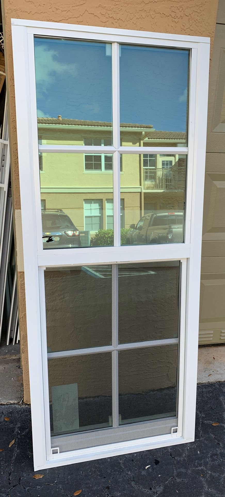 26.25x62.75 PGT impact single hung impact window