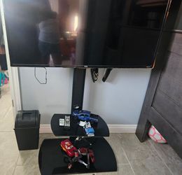 TCL Roku TV with floor stand