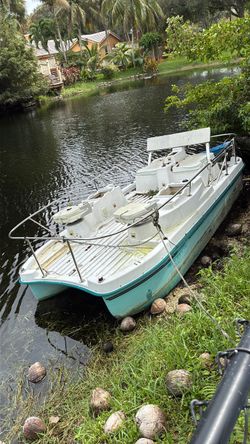 Fibreglass pontoon boat
