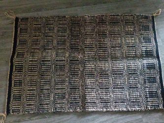 Woven Area Rug with Geometric Pattern