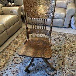 50 year old oak rolling secretary chair