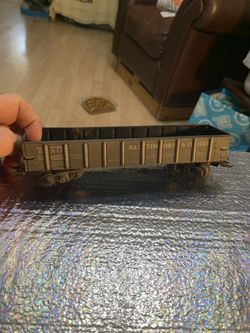 This is a vintage Marx 0 Gauge B&O 254000 tin lithographed gondola model train car. 
