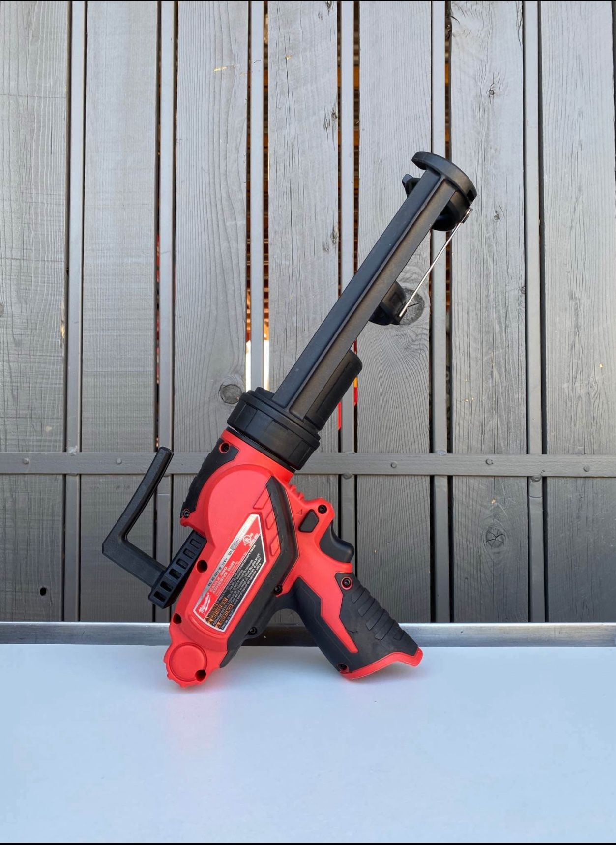 Milwaukee M12 12V Lithium Ion Cordless 10 oz. Adhesive and Caulk Gun (Tool Only)