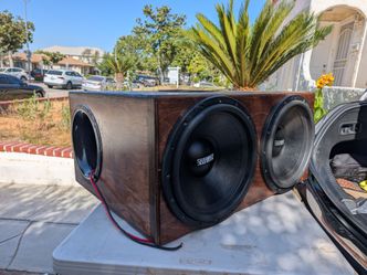 Sundown uv1 15s in a custom box dual 2 ohm subwoofers