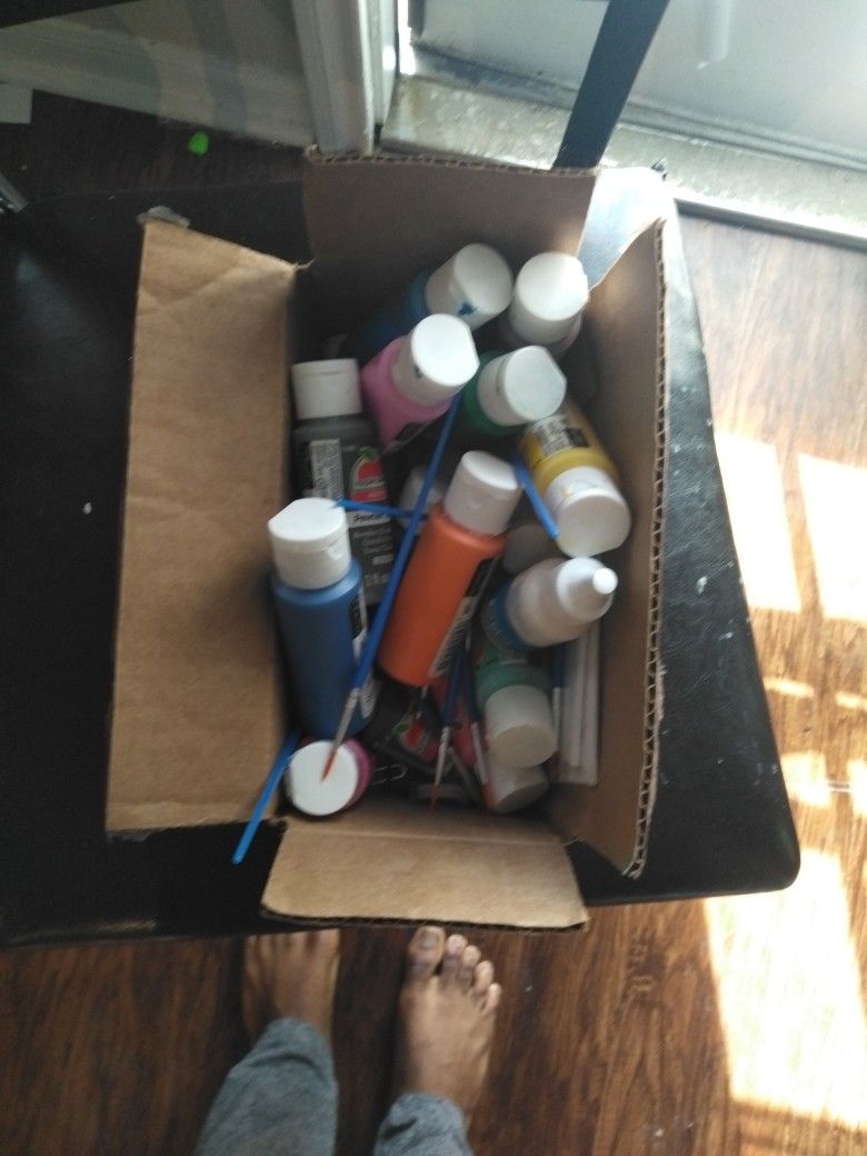 Paint Brushes And Used Paint