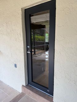 Modern Black Full Glass Exterior Door â€“ Impact/Hurricane Style
