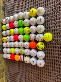 57 mixed used golf balls