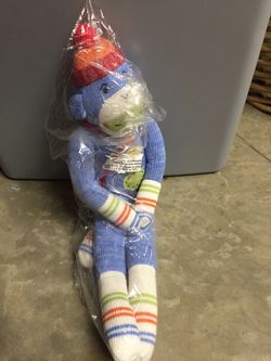 Brand new blue sock monkey stuffed animal