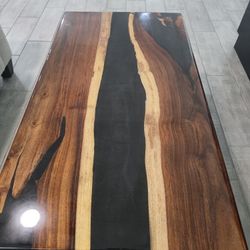 Coffee table, made of epoxy and precious walnut wood