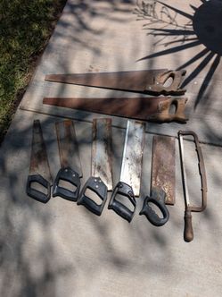 VINTAGE ASSORTED USED HAND SAWS