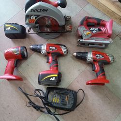 18 volt skil combo set two batteries two drills flashlight jigsaw Skil saw and charger