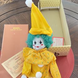 RARE Brinn's Collectible Porcelain musical Clown Doll.Comes with original box and COA