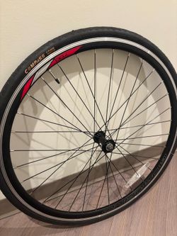 This is a 700c road bicycle wheel featuring a Compass brand tire.  28 x 15/8 x 11/8.. $50 Tire only
