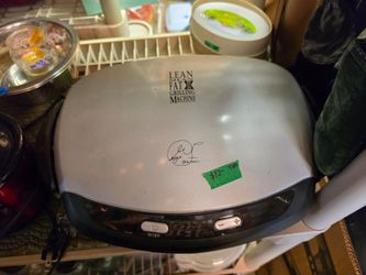 George Foreman Lean Mean Fat Reducing Grilling Machine.