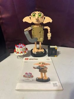 LEGO Harry Potter ... Dobby Set $15 LEGO set featuring Dobby from Harry Potter, includes instruction manual.