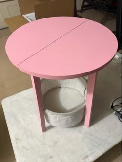 Pink table with storage