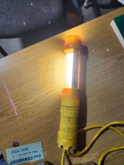 Yellow hand shop light lamp