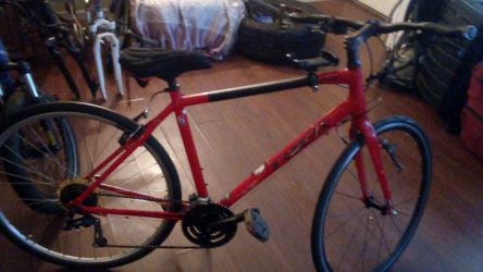 red Trek hybrid bicycle