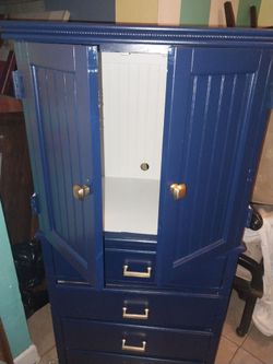 Navy blue shaker style cabinet