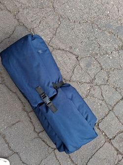 Blue Rolled Sleeping Pad or Camping Mat