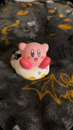 Kirby in a donut figurine
