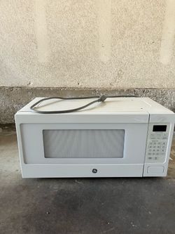 24 inch over the counter GE microwave