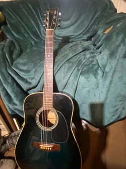 Acoustic Guitar $65