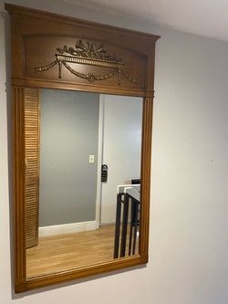 Large mirror with carved wood frame