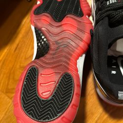 Jordan 11 Low “Bred”