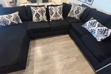 Couch with ottoman and pillows included