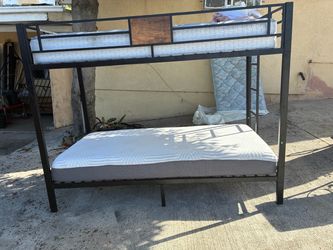 BEAUTIFUL BUNK BED WITH SEALY MATTRESS AND THE OTHER FOAM MATTRESS GOOD CONDITION THE FRAME IS LIKE NEW