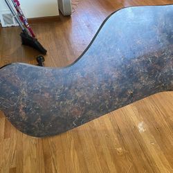 Uniquely shaped countertop table ready for the taken!