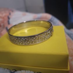 coach brace bracelet