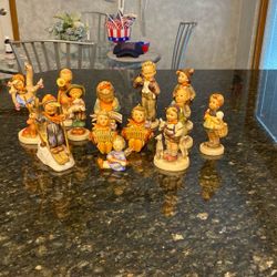 13 Hummel figurines 