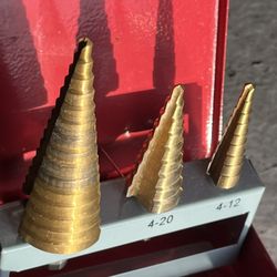 Titanium high-speed steel step drill bits