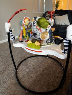 Fisher price jumperoo and activity center