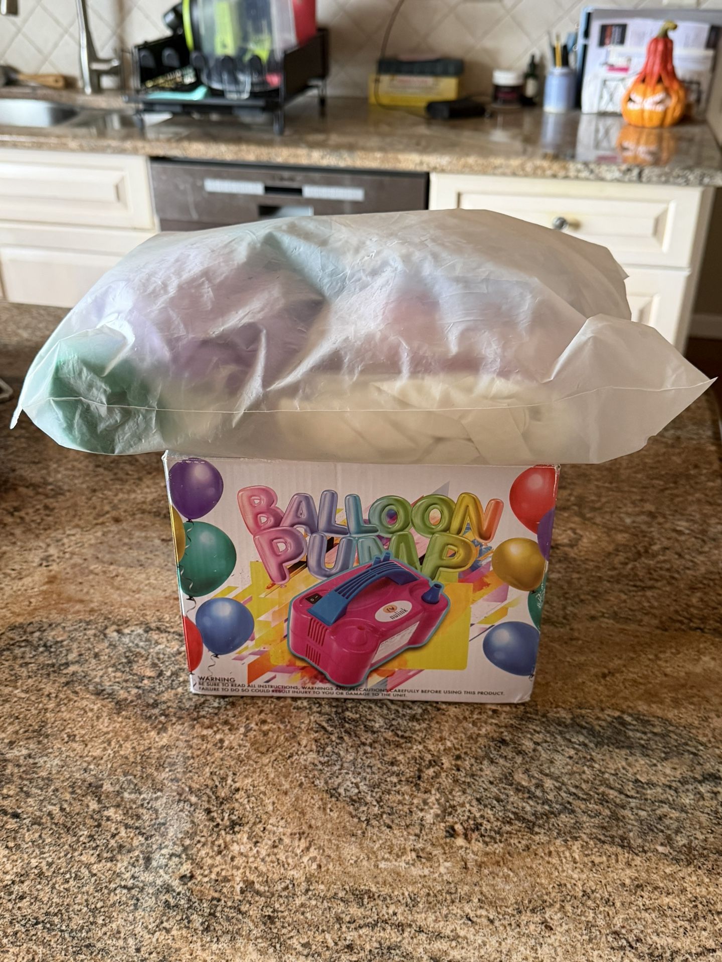 Balloon Pump w/ Various Colored Balloons