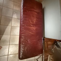 Vintage leather ottoman