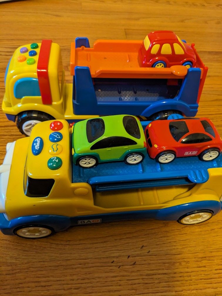 Two Toy Truck Car Carriers