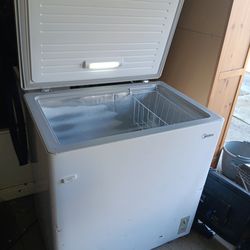 Midea upright freezer Works excellent 312133 are the dimensions