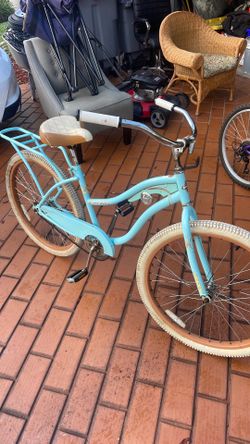 Woman’s Huffy Lady Blue Bicycle
