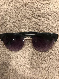 Purple shade with gold rim sunglasses