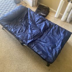 Toddlers Cot With Built In Sleeping Bag