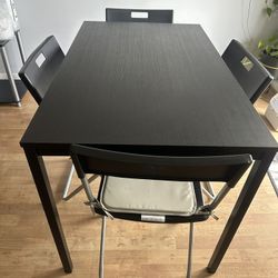 Dining Table And Four Chairs 