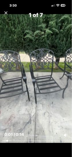 4 black patio chairs